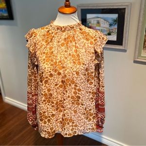 Blouse with metallic accents